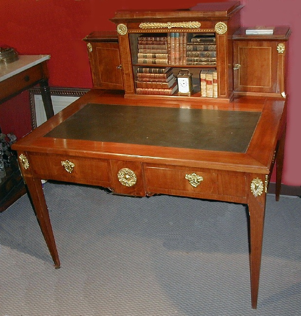 Item # 9993
Mahogany neoclassic writing table with gilt bronze mounts. Sweden, circa 1850.
48"w x 41"d x 50"h

Price $3,900